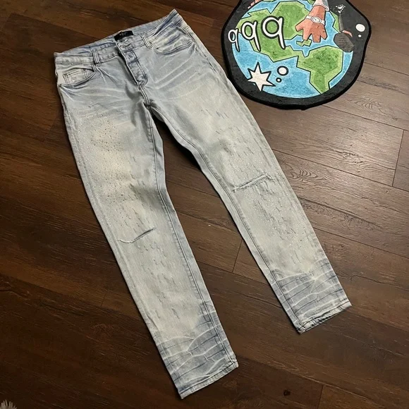 Amiri Light Wash Distressed Skinny Jeans